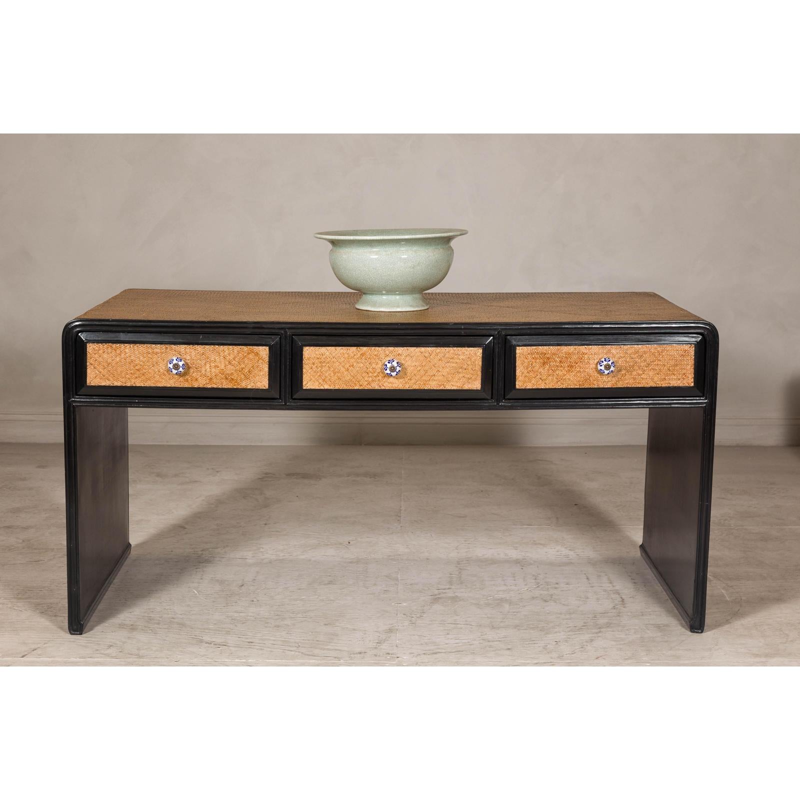 Rattan over Wood Waterfall Desk with Black Lacquer Finish and Three Drawers