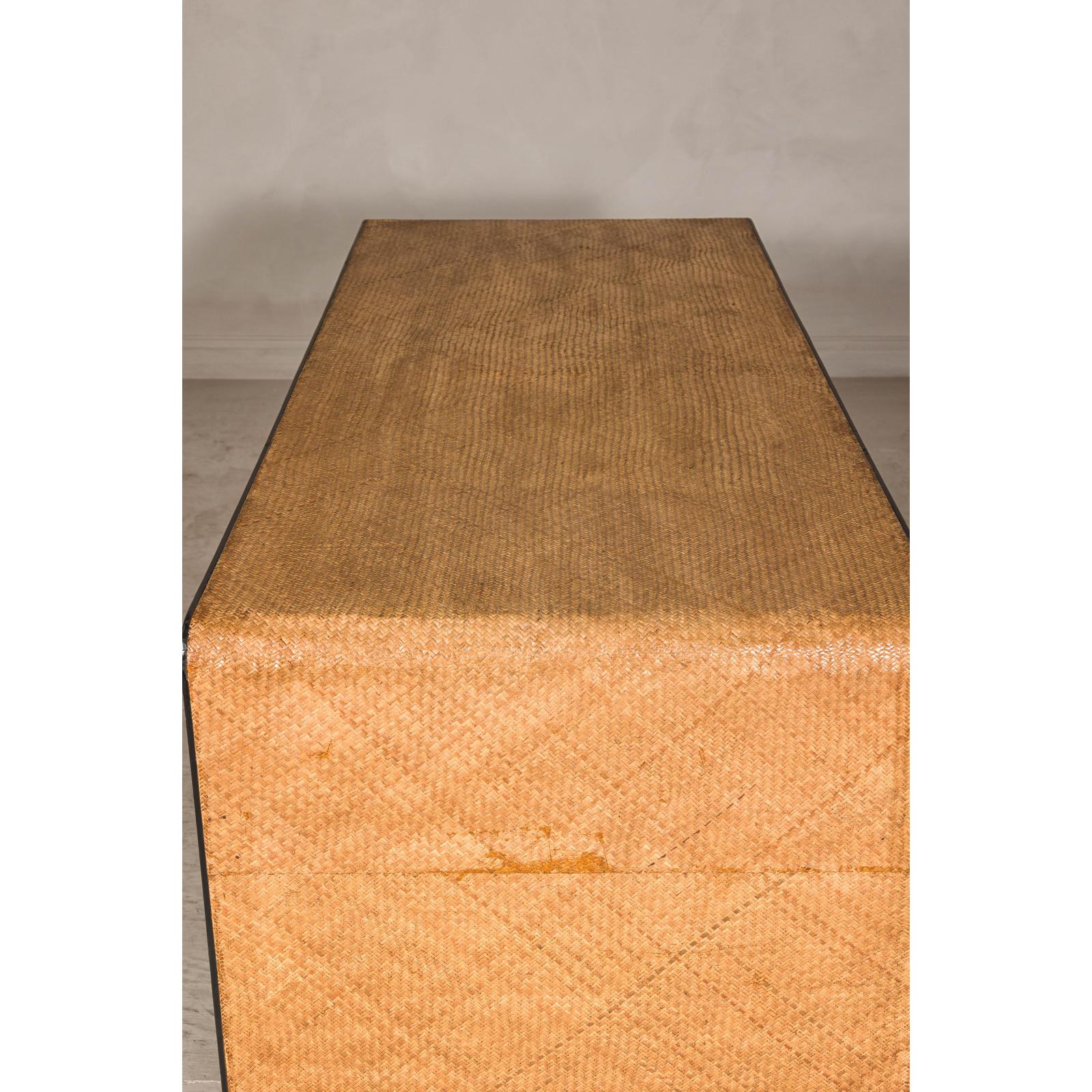 Rattan over Wood Waterfall Desk with Black Lacquer Finish and Three Drawers