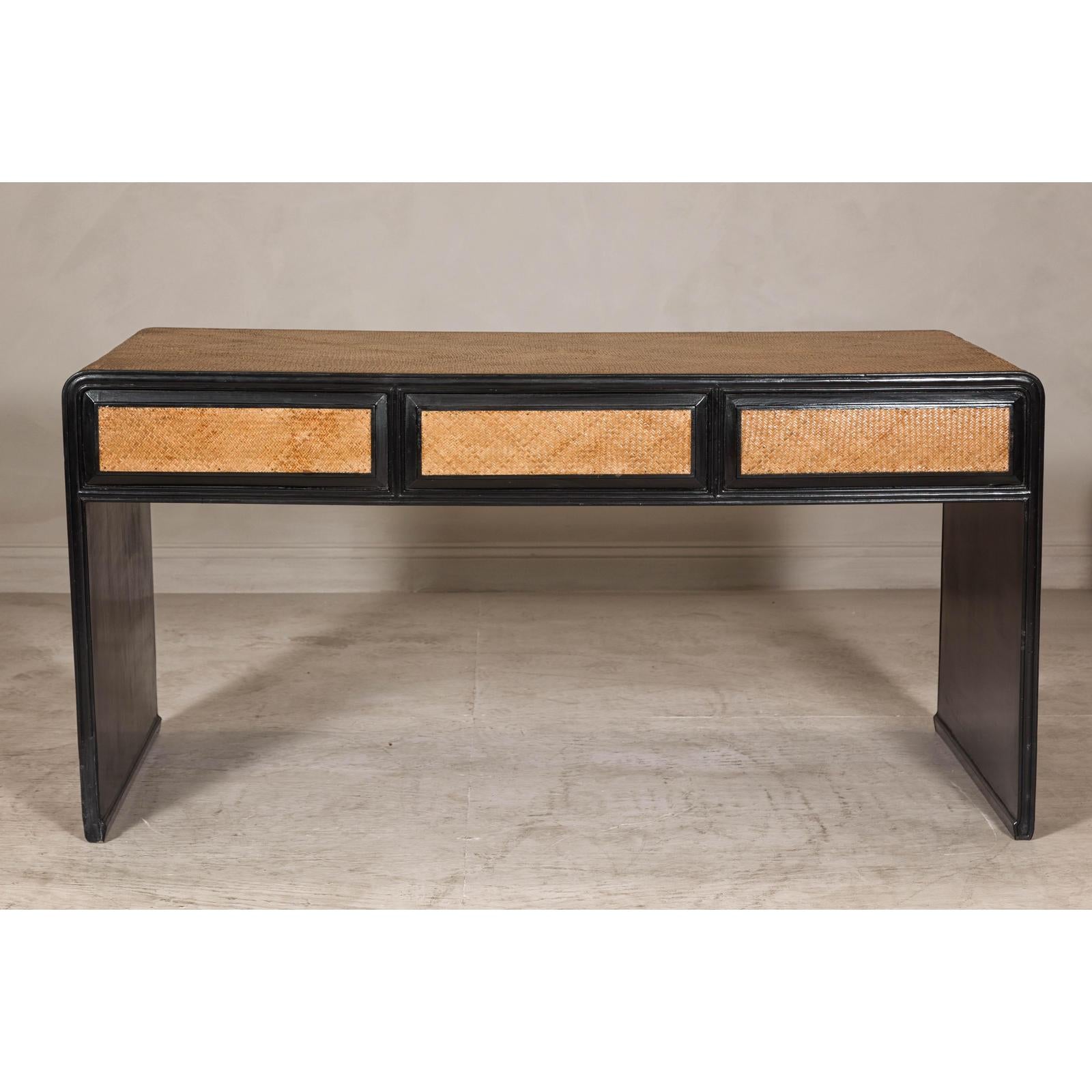 Rattan over Wood Waterfall Desk with Black Lacquer Finish and Three Drawers