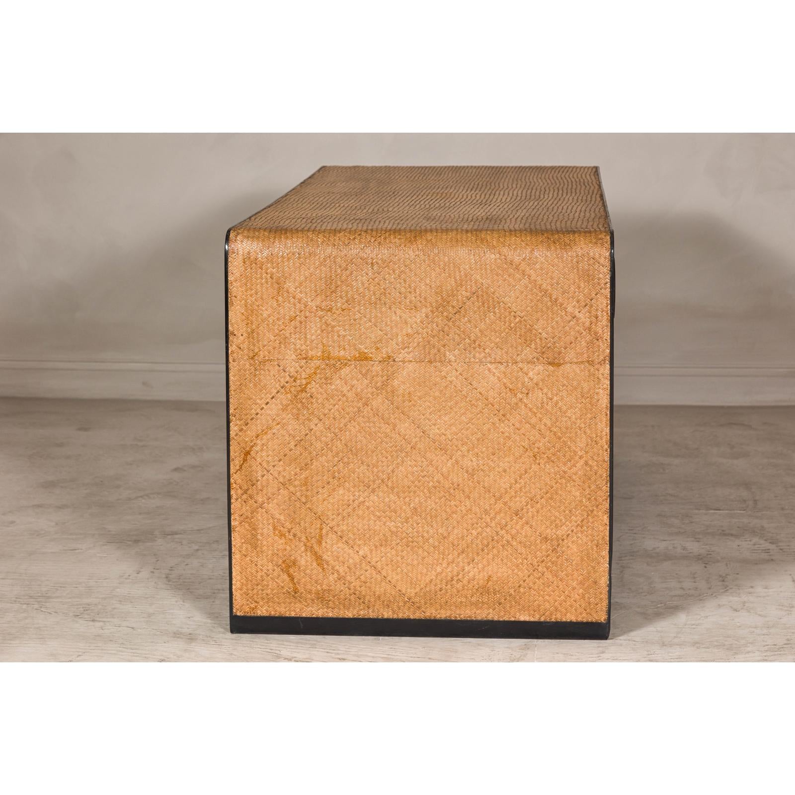 Rattan over Wood Waterfall Desk with Black Lacquer Finish and Three Drawers