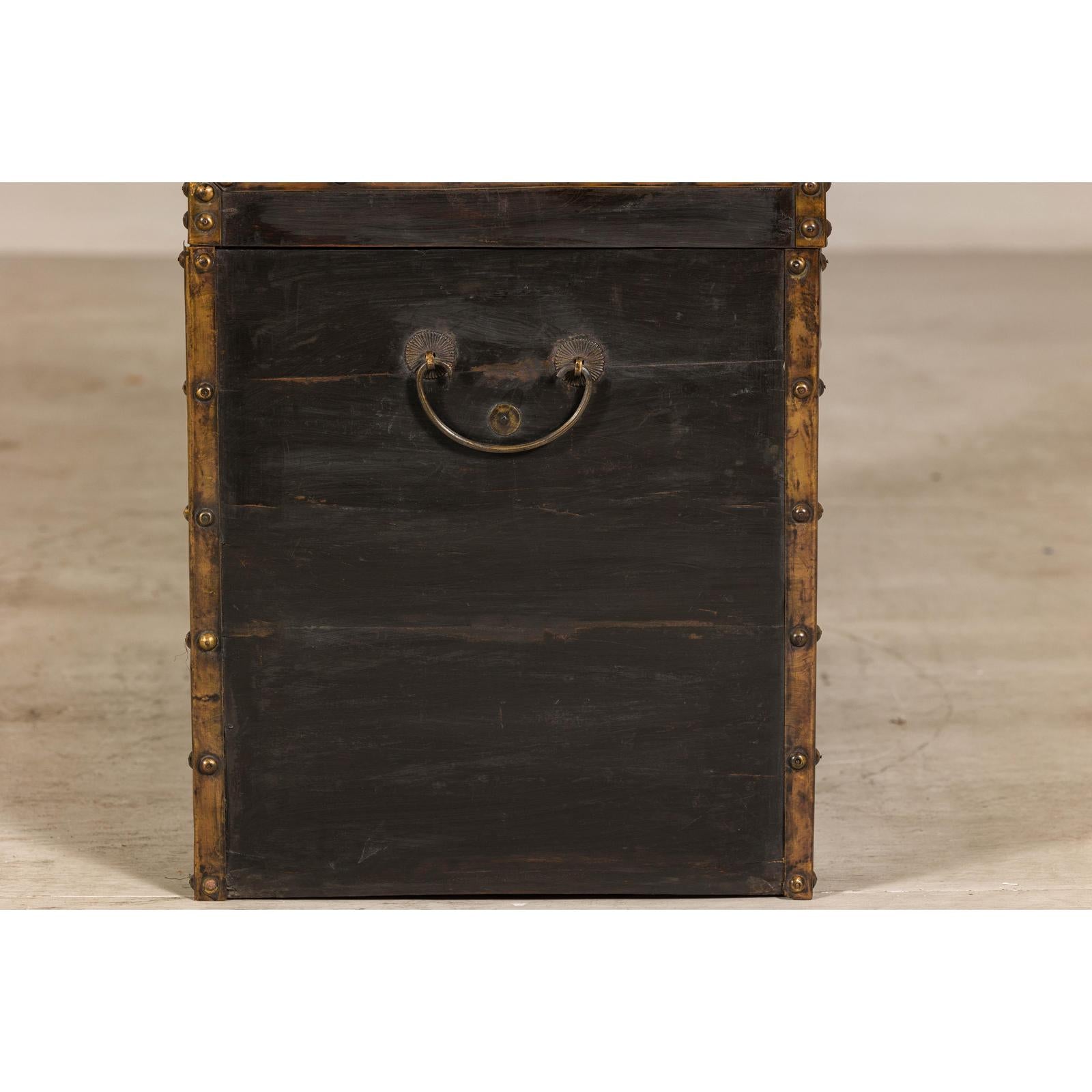 Antique Black and Gold Late Qing Dynasty Trunk with Curved Top and Brass Accents