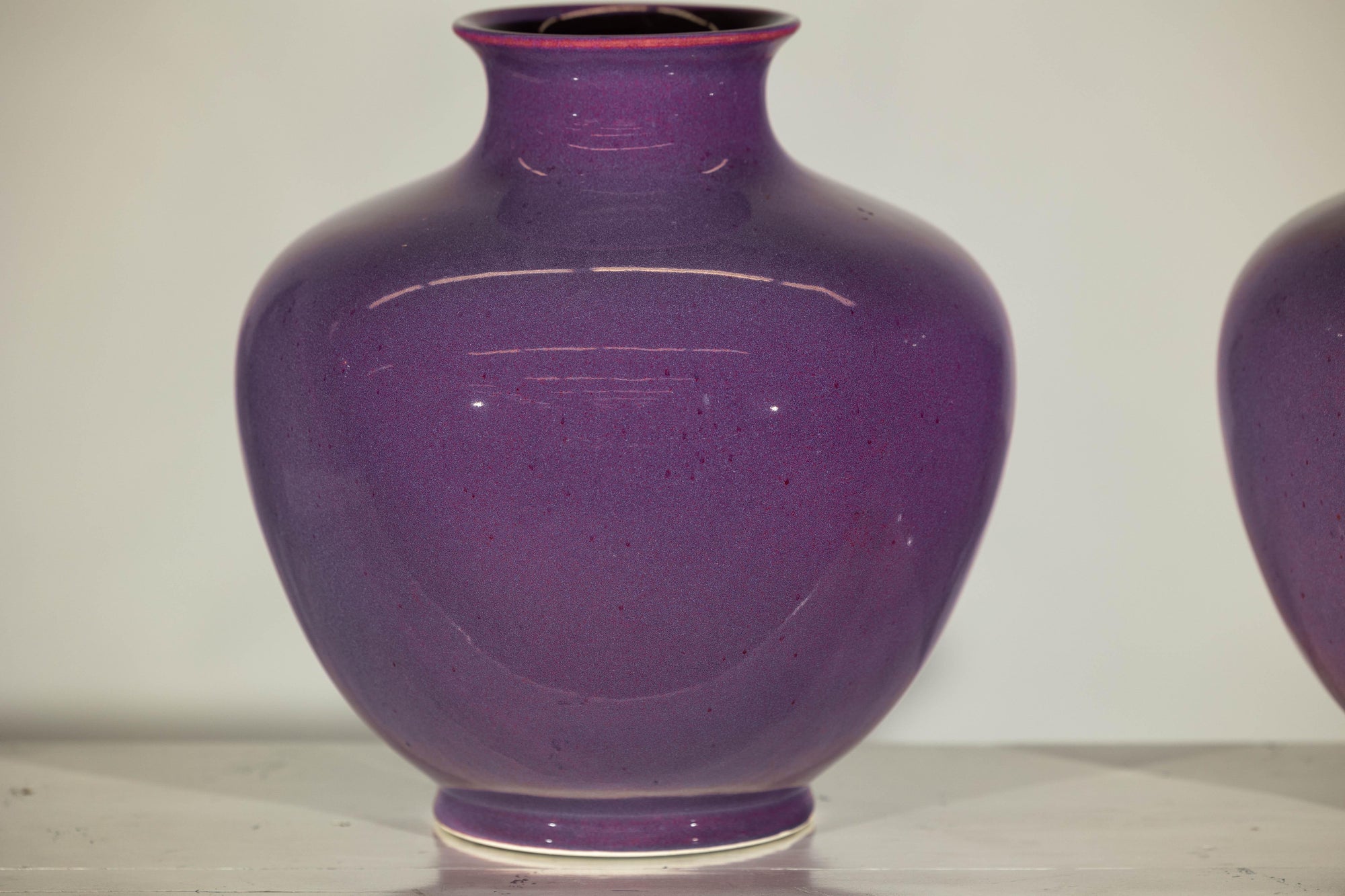 Pair of Purple Ceramic Vases with Glossy Finish and Rounded Bellies