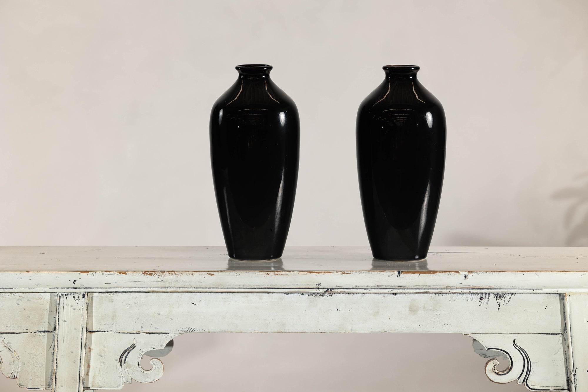 Pair of Vintage Black Porcelain Vases with Glossy Glaze and Narrow Necks