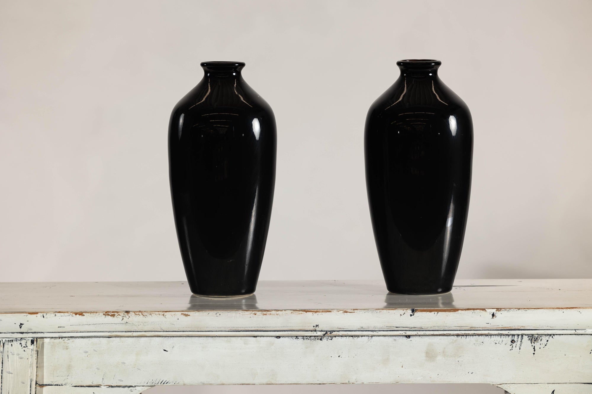Pair of Vintage Black Porcelain Vases with Glossy Glaze and Narrow Necks