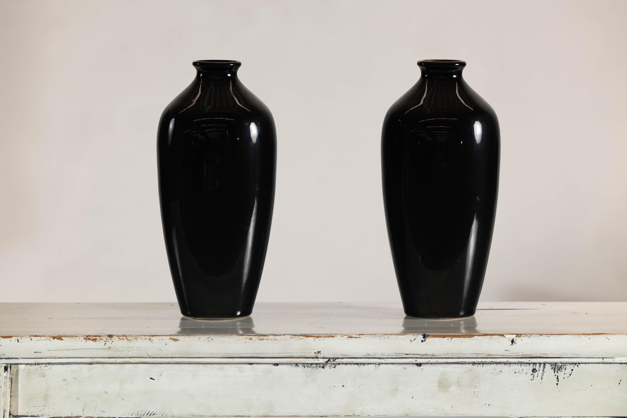 Pair of Vintage Black Porcelain Vases with Glossy Glaze and Narrow Necks