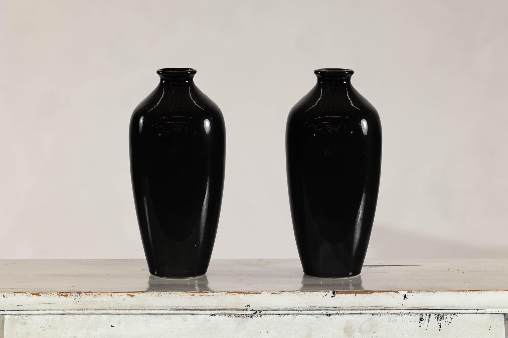 Pair of Vintage Black Porcelain Vases with Glossy Glaze and Narrow Necks