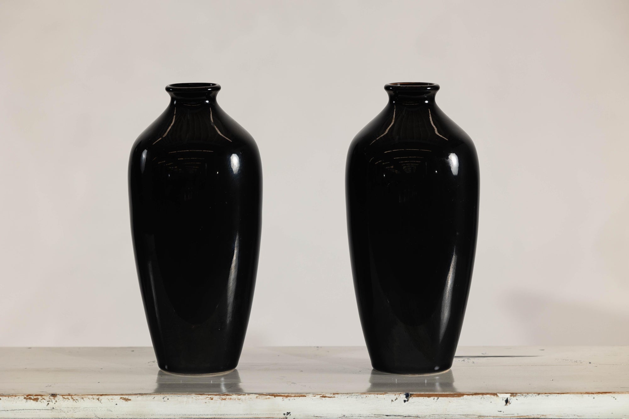 Pair of Vintage Black Porcelain Vases with Glossy Glaze and Narrow Necks