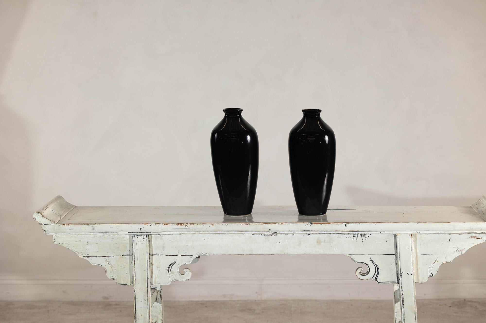 Pair of Vintage Black Porcelain Vases with Glossy Glaze and Narrow Necks