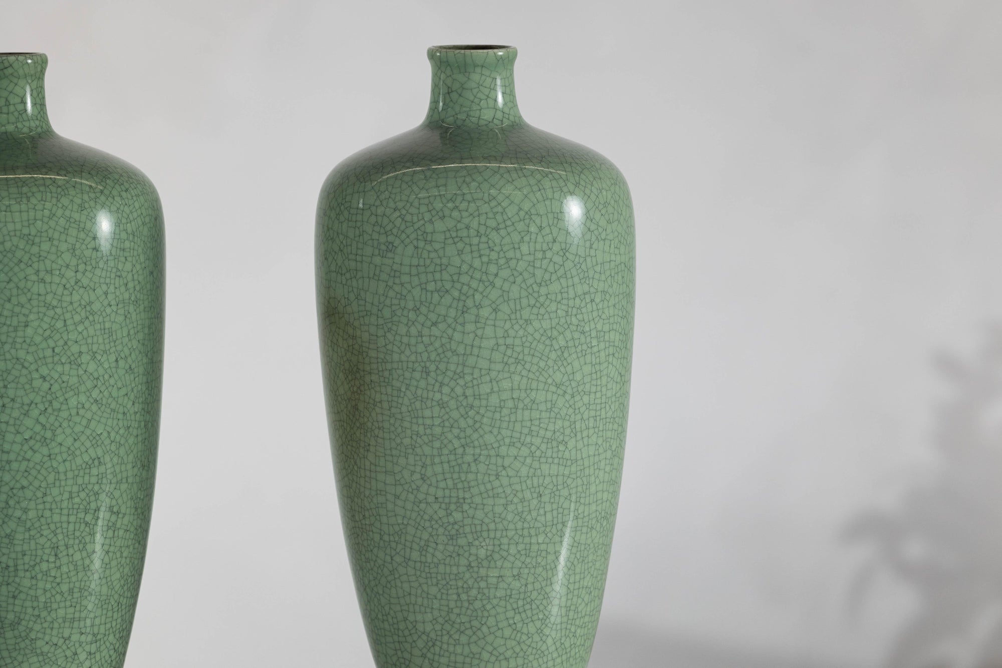 Pair of Vintage Celadon Porcelain Vases with Elegant Crackled Glaze