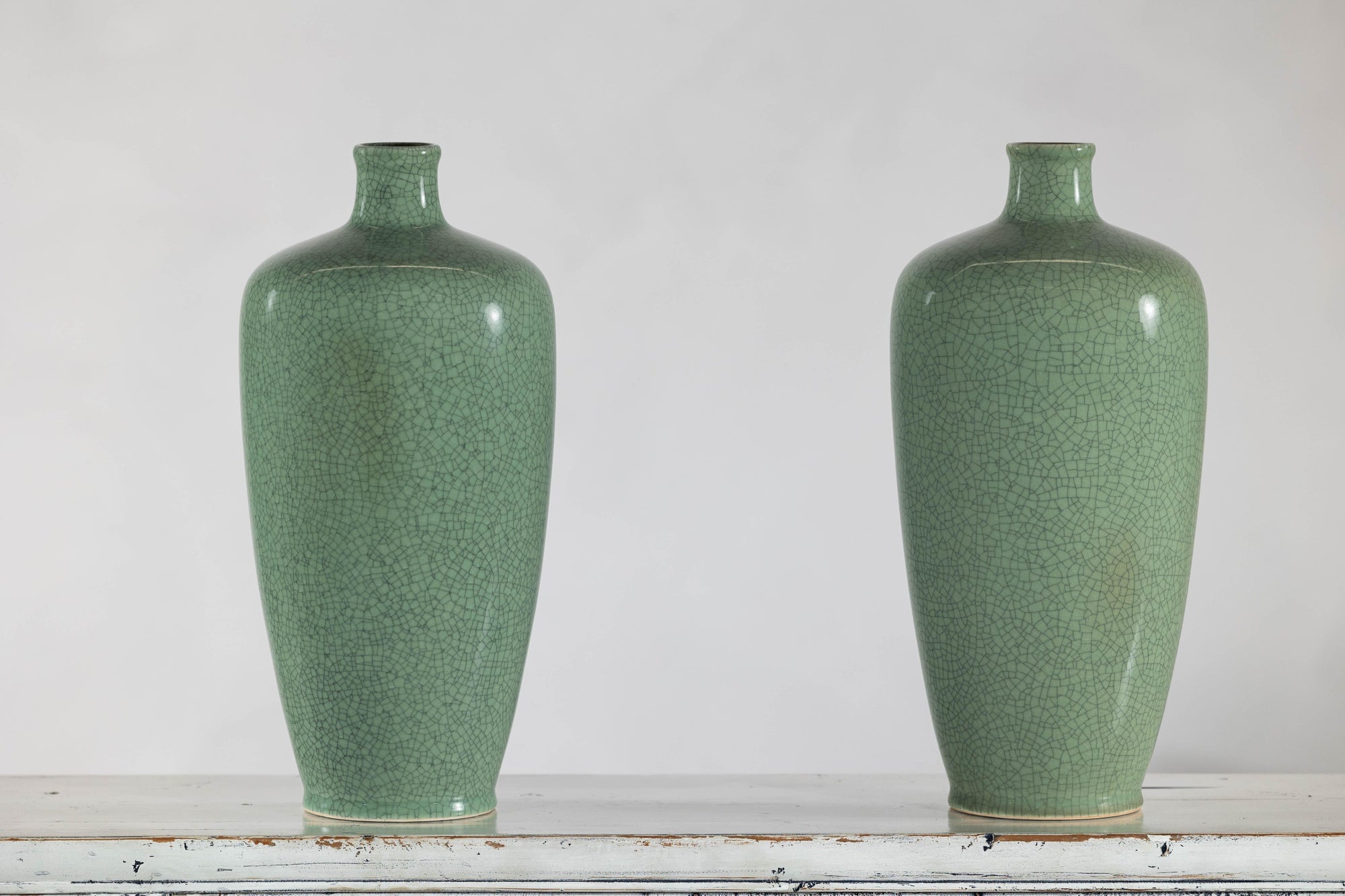 Pair of Vintage Celadon Porcelain Vases with Elegant Crackled Glaze