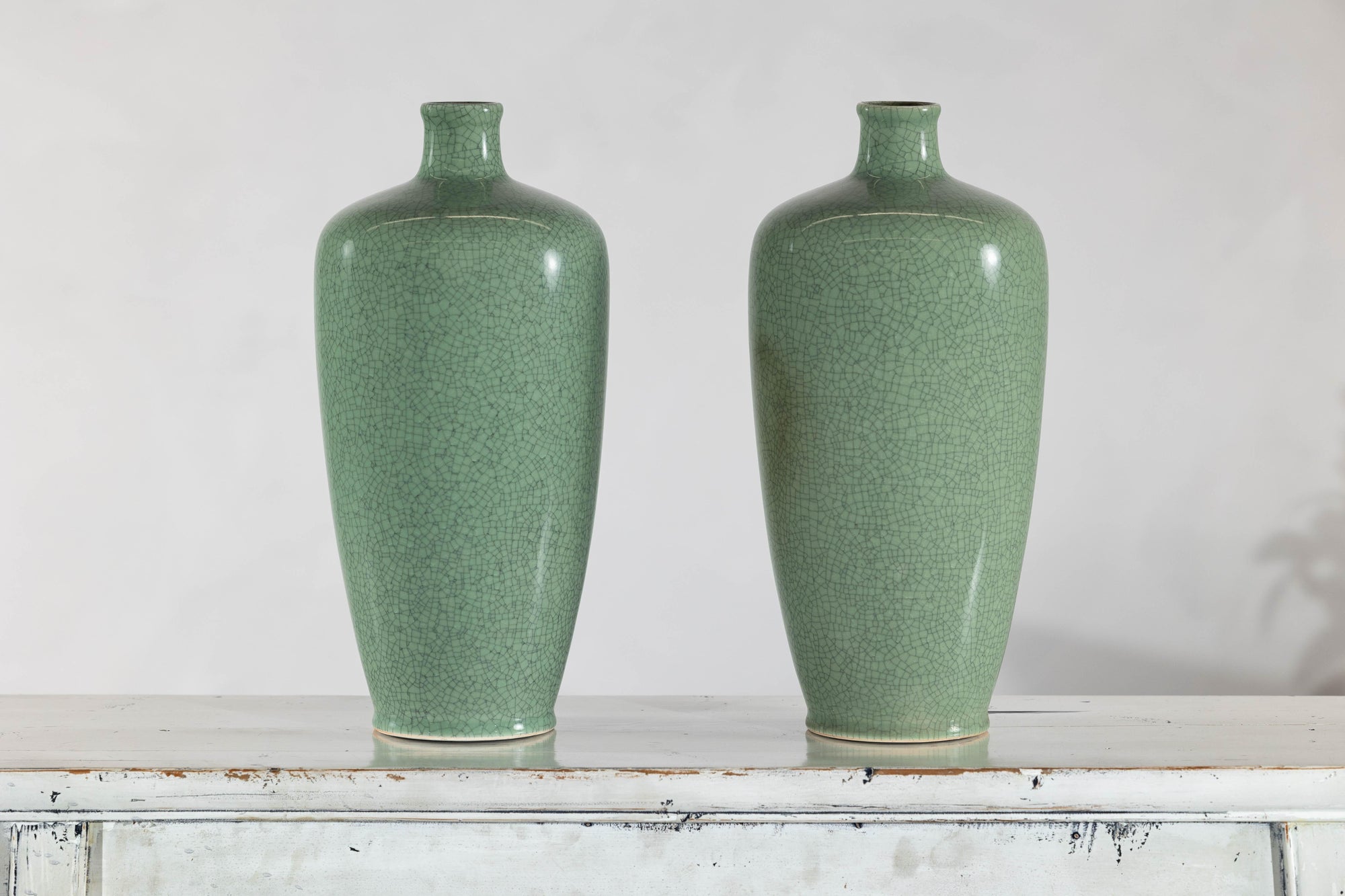 Pair of Vintage Celadon Porcelain Vases with Elegant Crackled Glaze