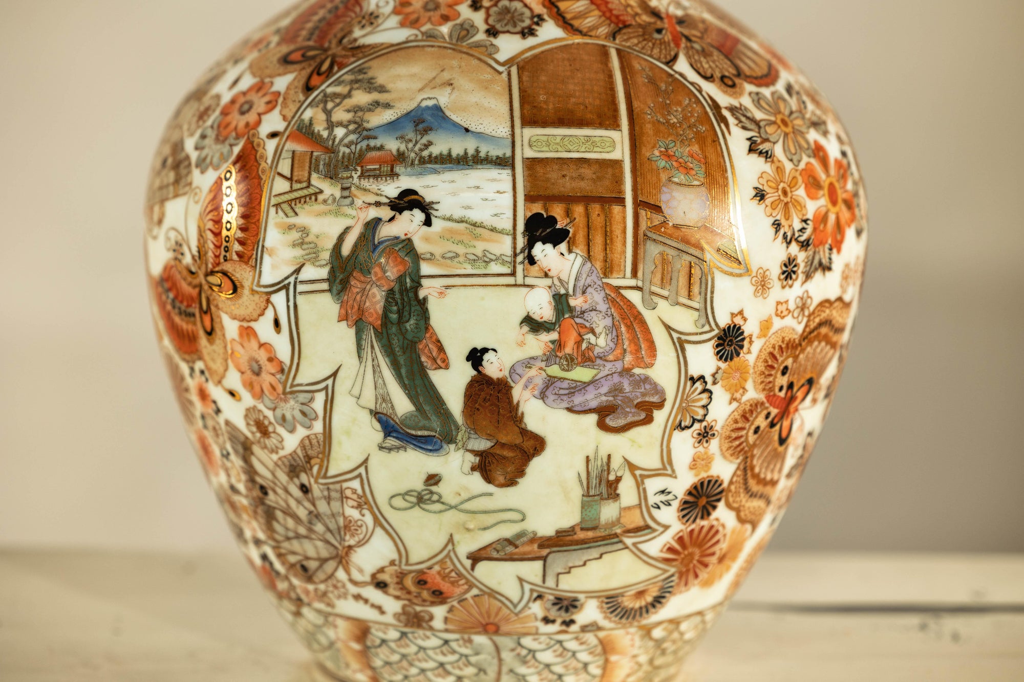 Early 20th-Century Kutani-Style Porcelain Vase with Scenic and Floral Designs