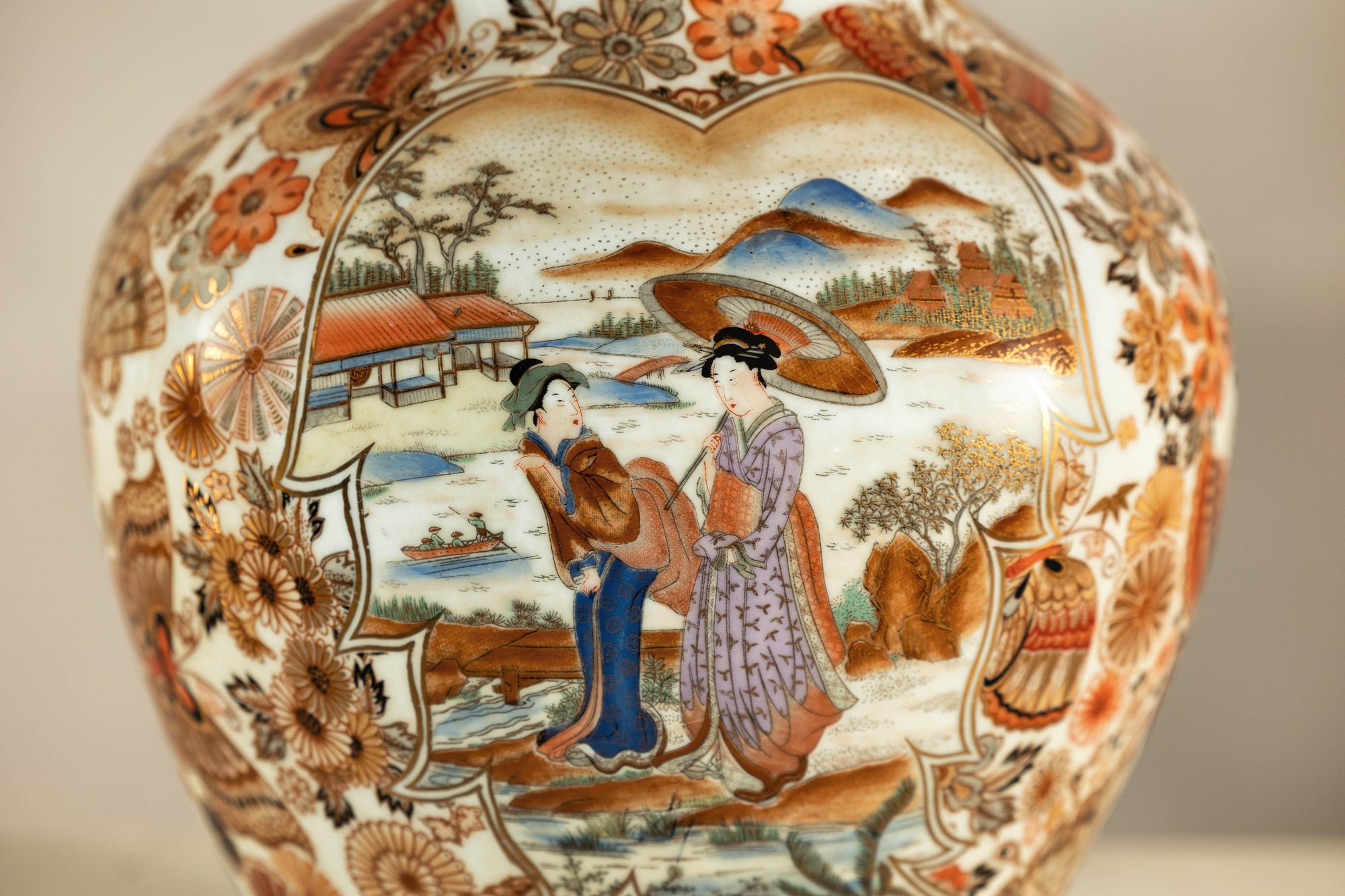 Early 20th-Century Kutani-Style Porcelain Vase with Scenic and Floral Designs