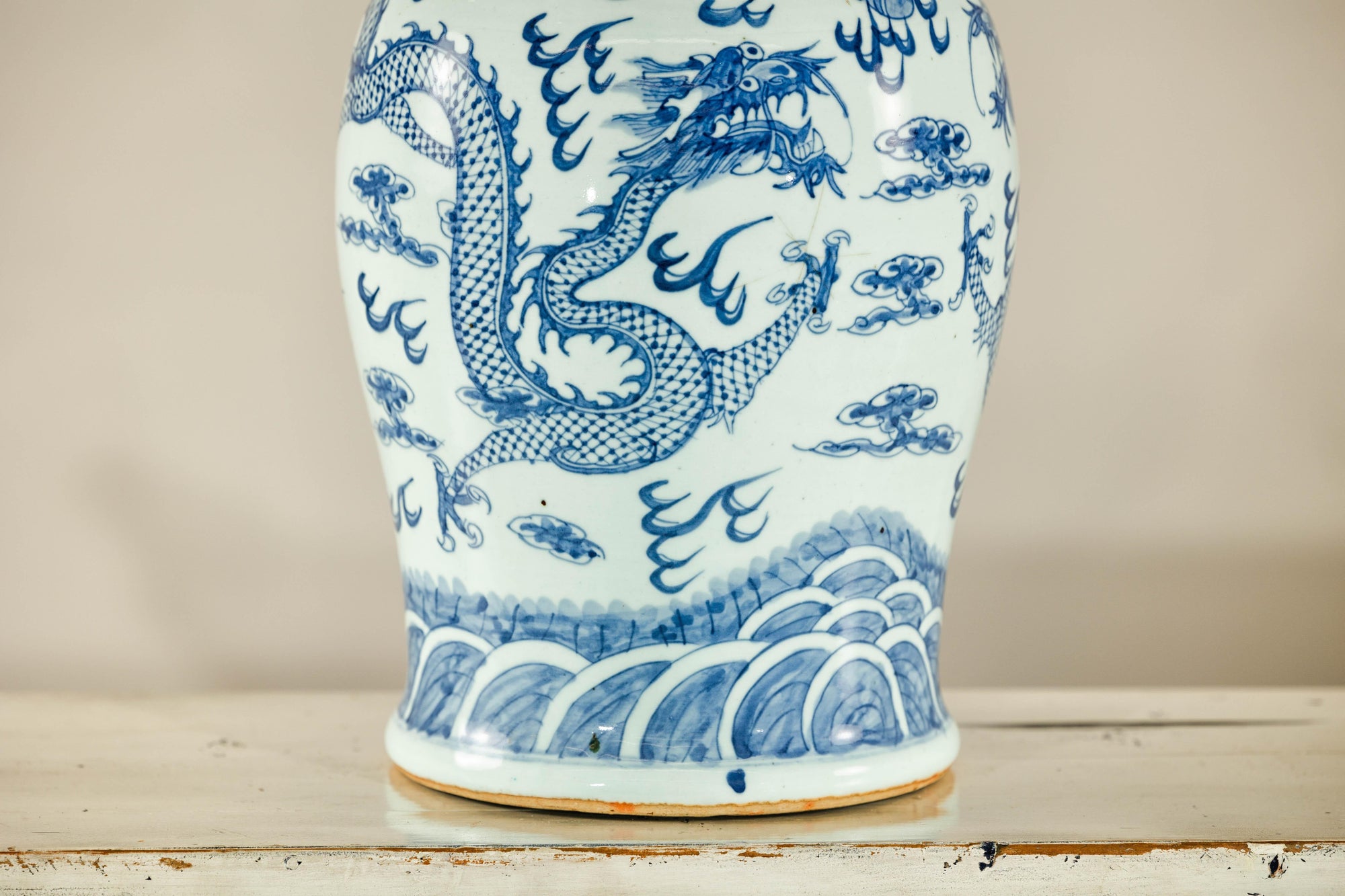 Qing Dynasty Blue and White Porcelain Dragon Jar with Lid and Foo Dog Finial