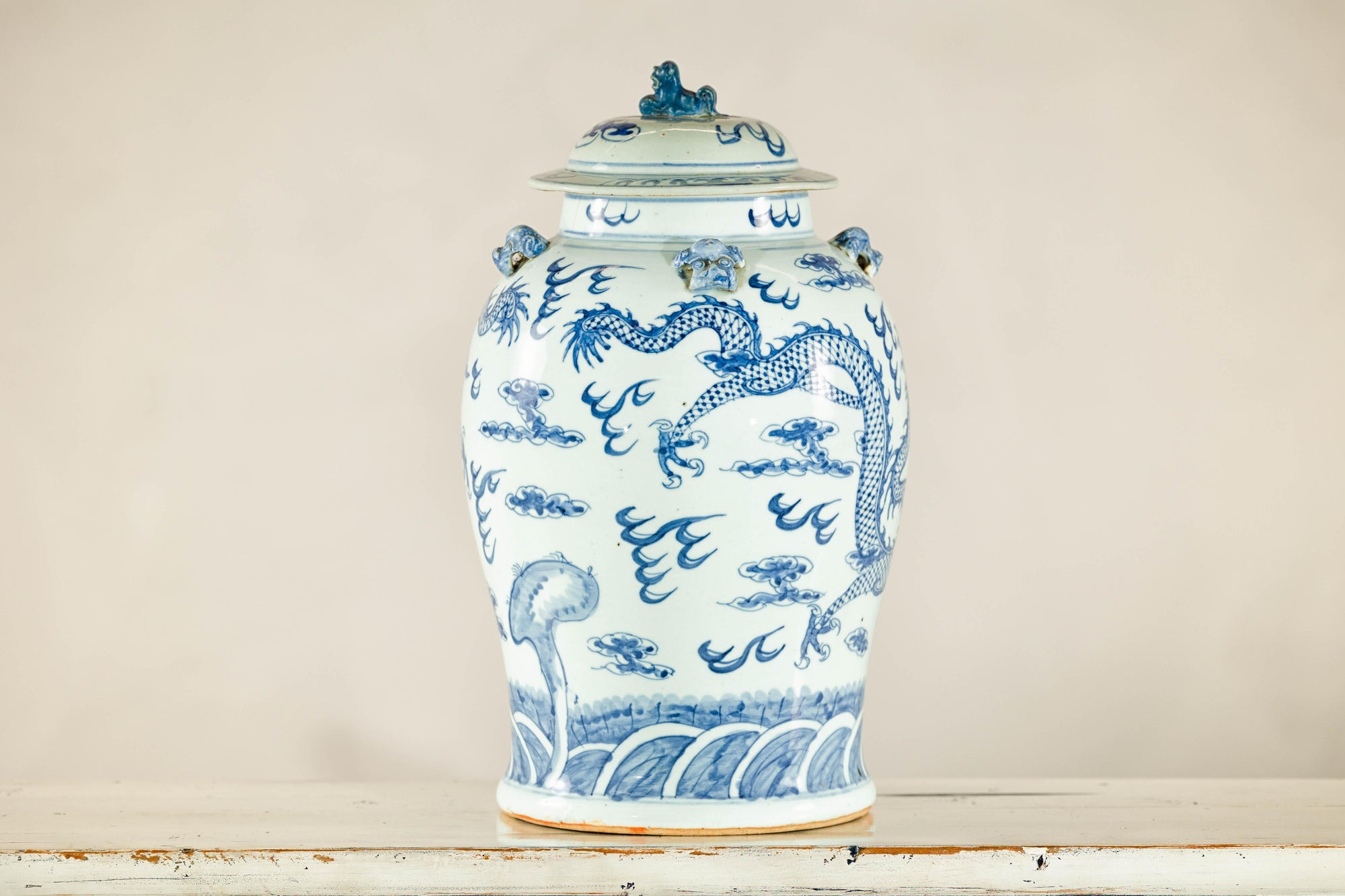 Qing Dynasty Blue and White Porcelain Dragon Jar with Lid and Foo Dog Finial