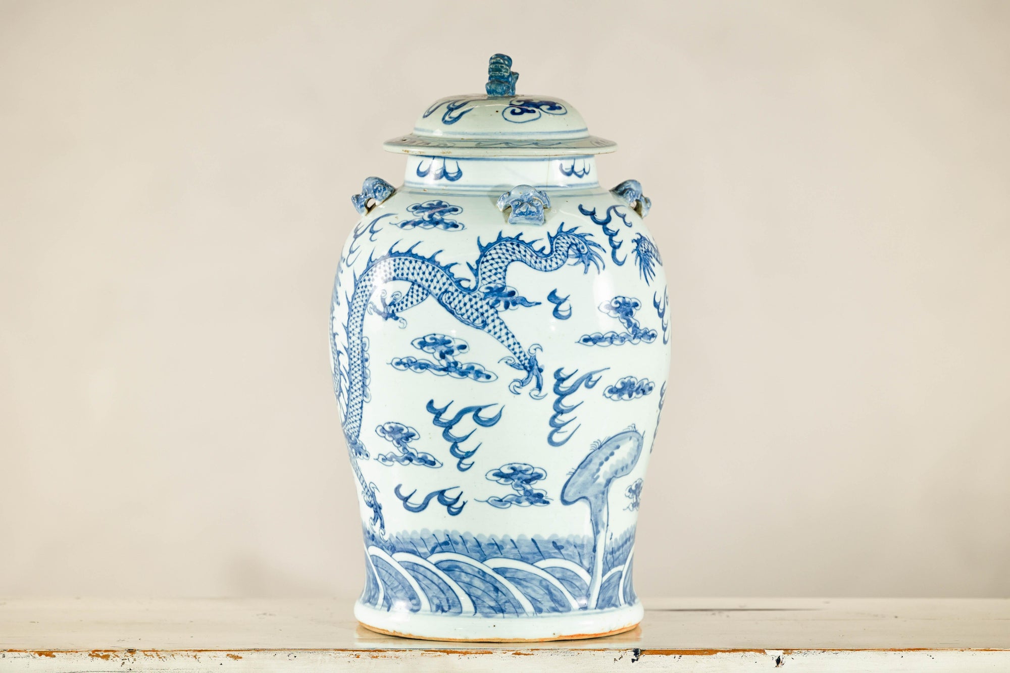 Qing Dynasty Blue and White Porcelain Dragon Jar with Lid and Foo Dog Finial