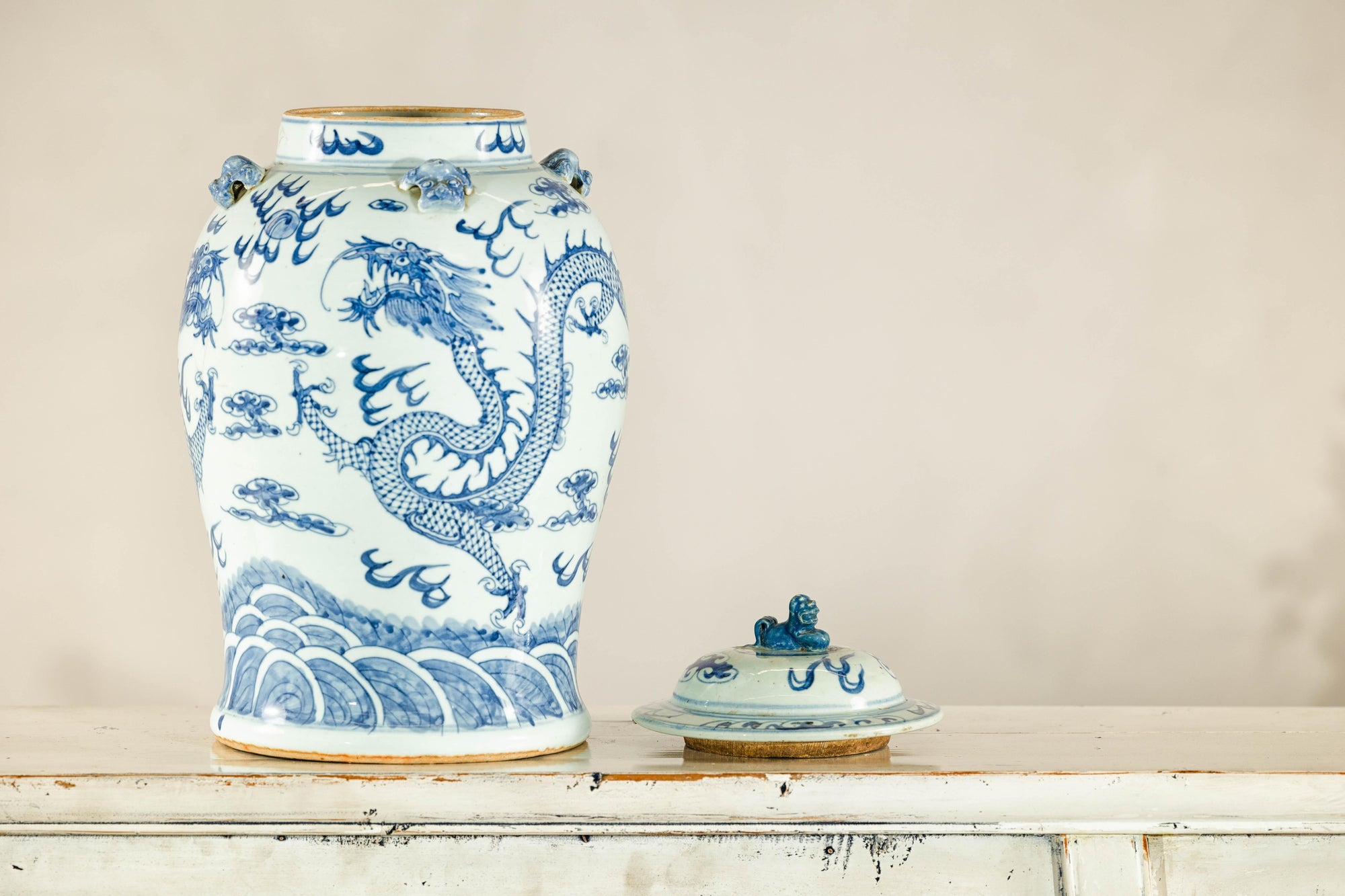 Qing Dynasty Blue and White Porcelain Dragon Jar with Lid and Foo Dog Finial