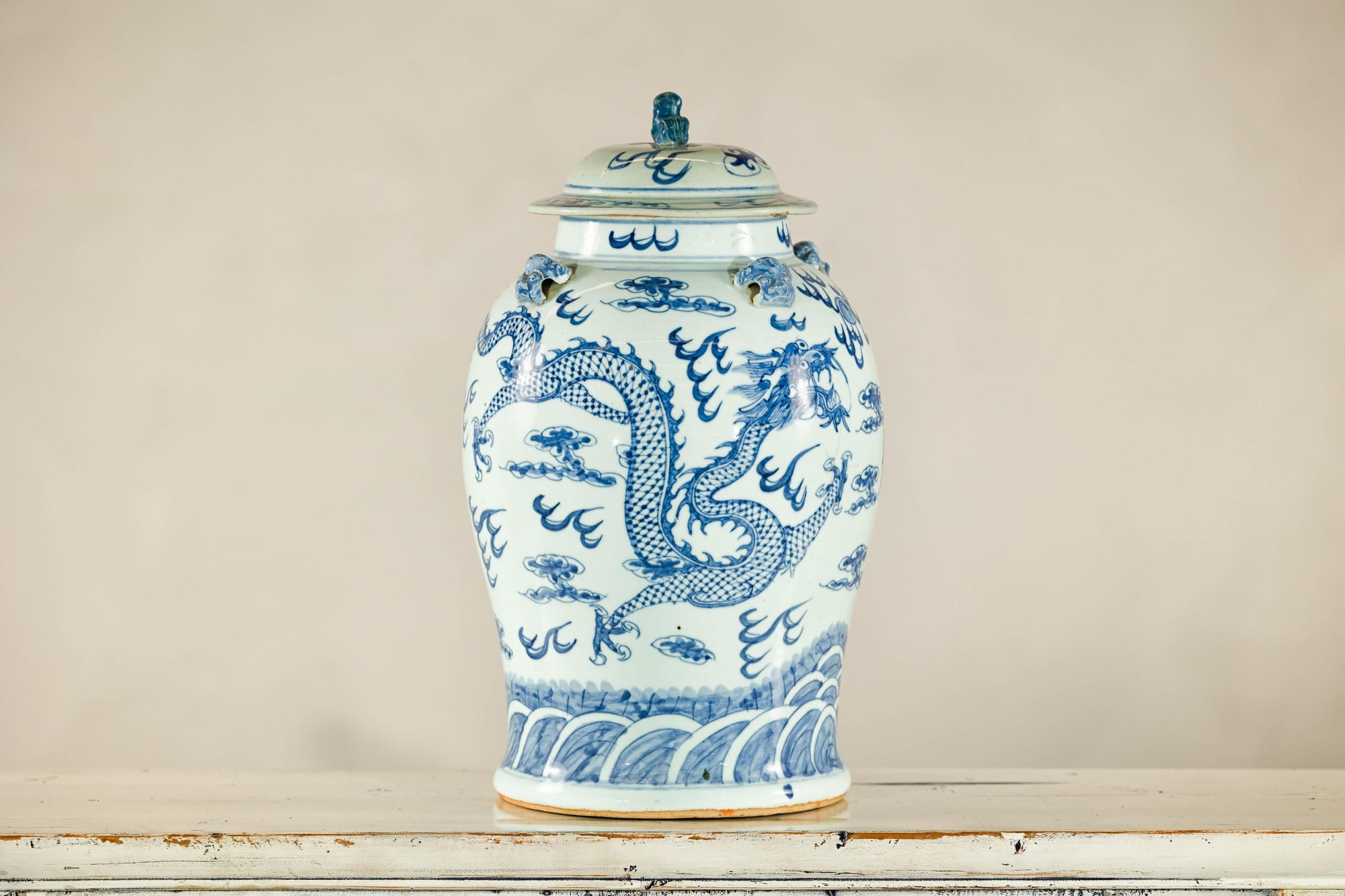 Qing Dynasty Blue and White Porcelain Dragon Jar with Lid and Foo Dog Finial