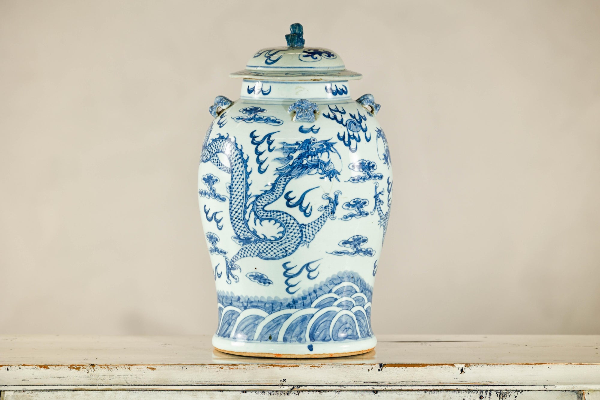 Qing Dynasty Blue and White Porcelain Dragon Jar with Lid and Foo Dog Finial