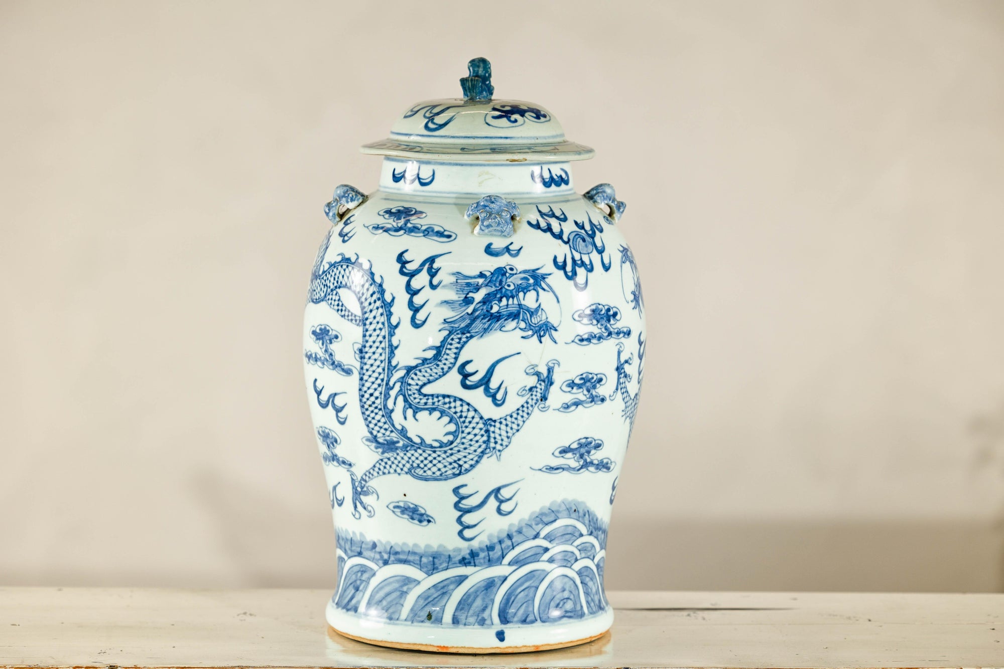 Qing Dynasty Blue and White Porcelain Dragon Jar with Lid and Foo Dog Finial