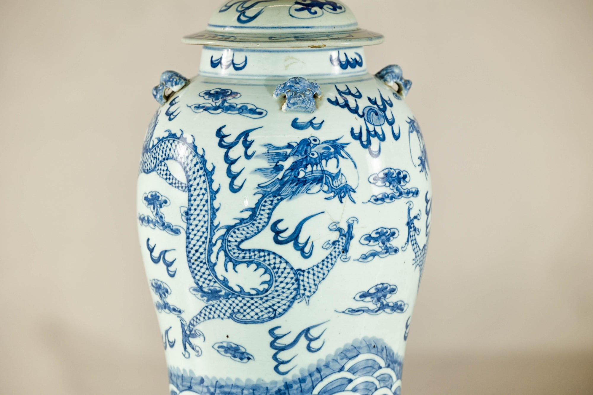 Qing Dynasty Blue and White Porcelain Dragon Jar with Lid and Foo Dog Finial