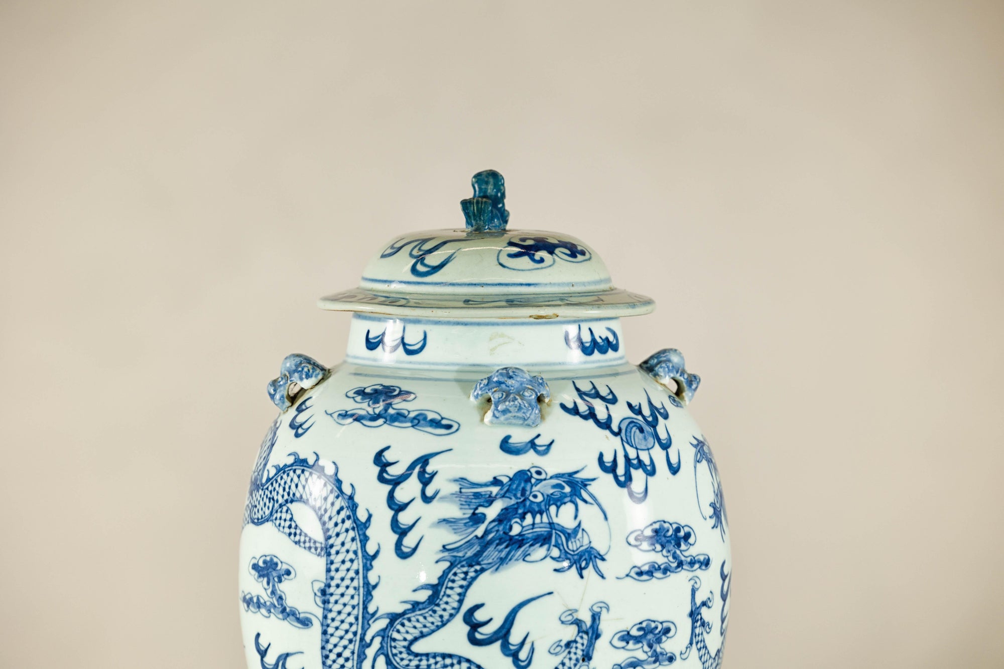 Qing Dynasty Blue and White Porcelain Dragon Jar with Lid and Foo Dog Finial