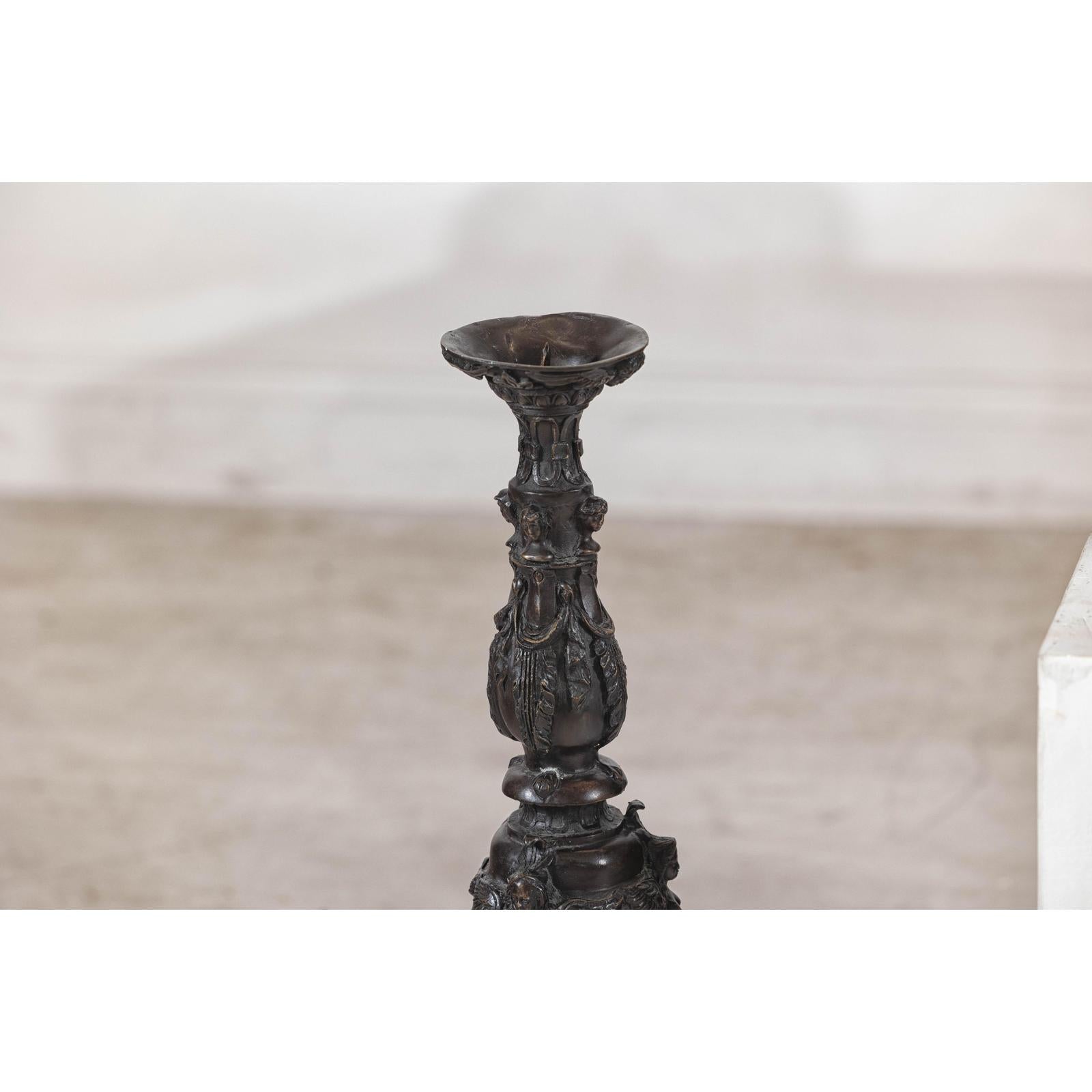 Baroque-Style Ornate Metal Candlesticks with Cherub, Volute and Garland Motifs