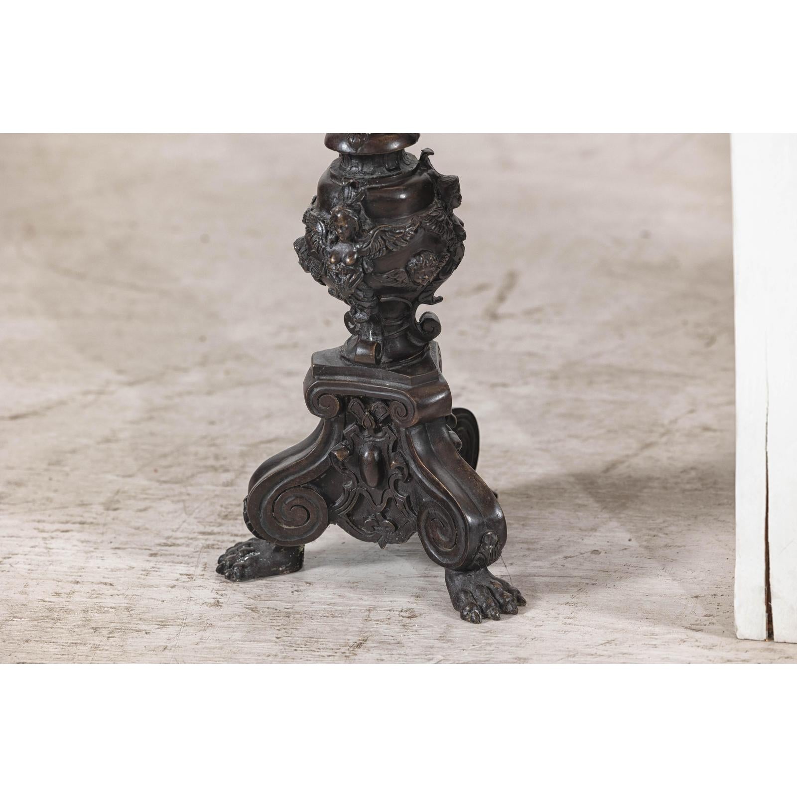Baroque-Style Ornate Metal Candlesticks with Cherub, Volute and Garland Motifs