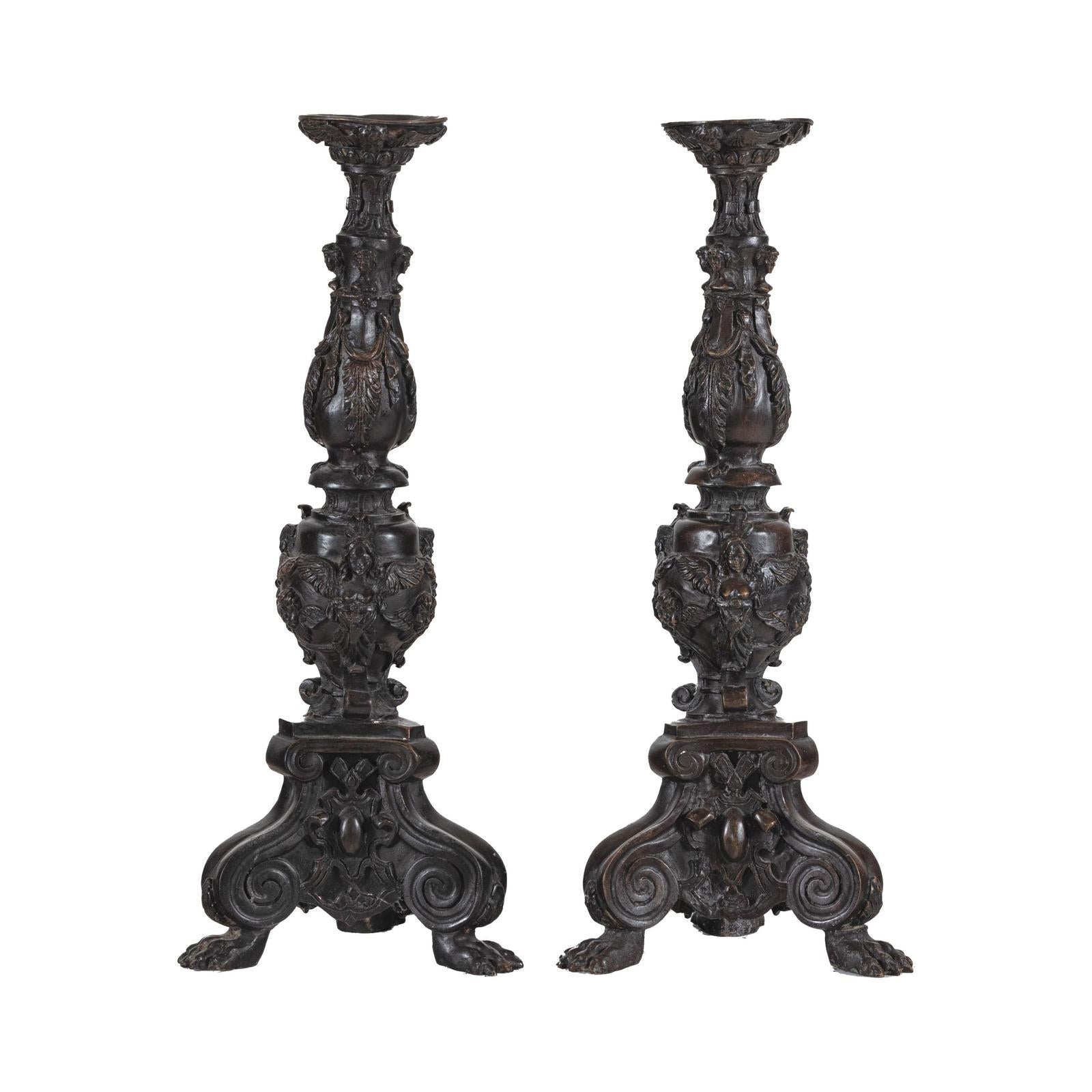 Baroque-Style Ornate Metal Candlesticks with Cherub, Volute and Garland Motifs