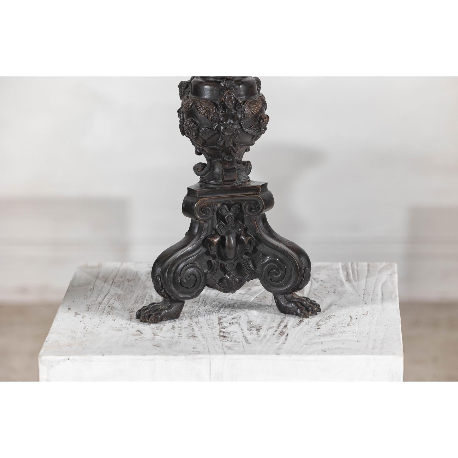 Baroque-Style Ornate Metal Candlesticks with Cherub, Volute and Garland Motifs