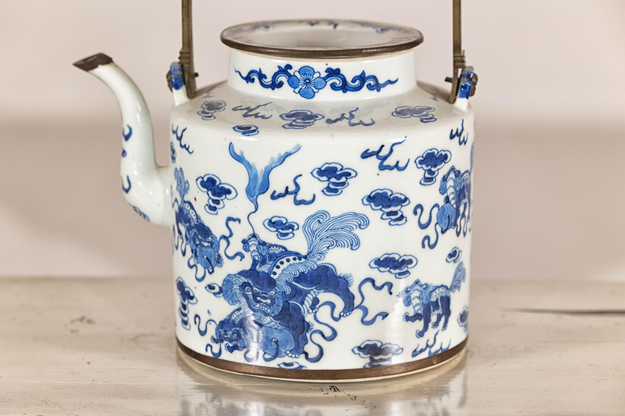 Blue and White Porcelain Teapot with Mythical Qilin and Auspicious Cloud Motifs