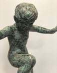 Bronze Snail Boy Garden Fountain, features child balancing on one leg with arms outstretched, white background.