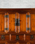 Wooden cabinet with multiple doors on a white background