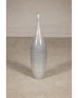 Gray ceramic bottle vase with spiral incising and glazed finish.