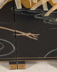 Close-up of crane legs, water and screen feet