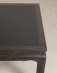 Chinese hardwood and dark stone coffee table surface detail
