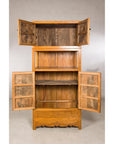 Tall Chinese cabinet with upper and lower doors open to interior shelves