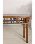 Right end view of the console table with openwork apron detail