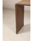 Close-up of a dark wood side panel and rounded top corner