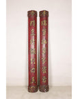 Front view of paired red Chinese panels with gilt calligraphy and carved ends