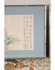 Detail of calligraphy beside the seated figure in a Japanese woodblock print