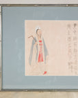 Close-up of the standing Japanese figure and vertical inscription