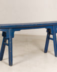 Blue painted wood narrow bench base view