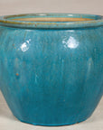 Turquoise glazed stoneware planter angled view
