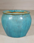 Turquoise glazed stoneware planter back view