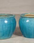 Turquoise glazed stoneware planter close-up detail