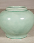 Left side view of the rounded celadon ginger jar form vase
