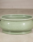 Alternate side view of the pale green crackle glaze footbath
