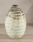 Large cream-glazed ceramic vase with horizontal brown swirled bands.