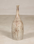 Cream and brown glazed ceramic bottle vase surface detail